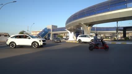 Cars, streets, Awqaf Bridge