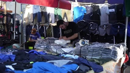 بائع ملابس , سوق مريدي , اسواق شعبية