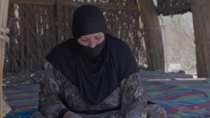 An Iraqi woman, the marshes of Al-Chibayish, preparing Iraqi bread