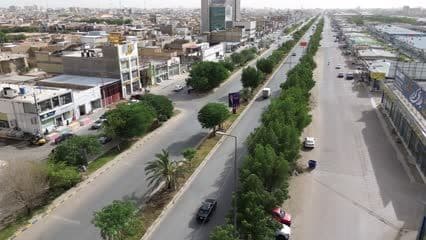 Green Belt Street, markets, trees, cars