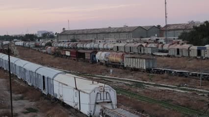 Train station, Al-Muthanna Street, Baghdad, train wagons